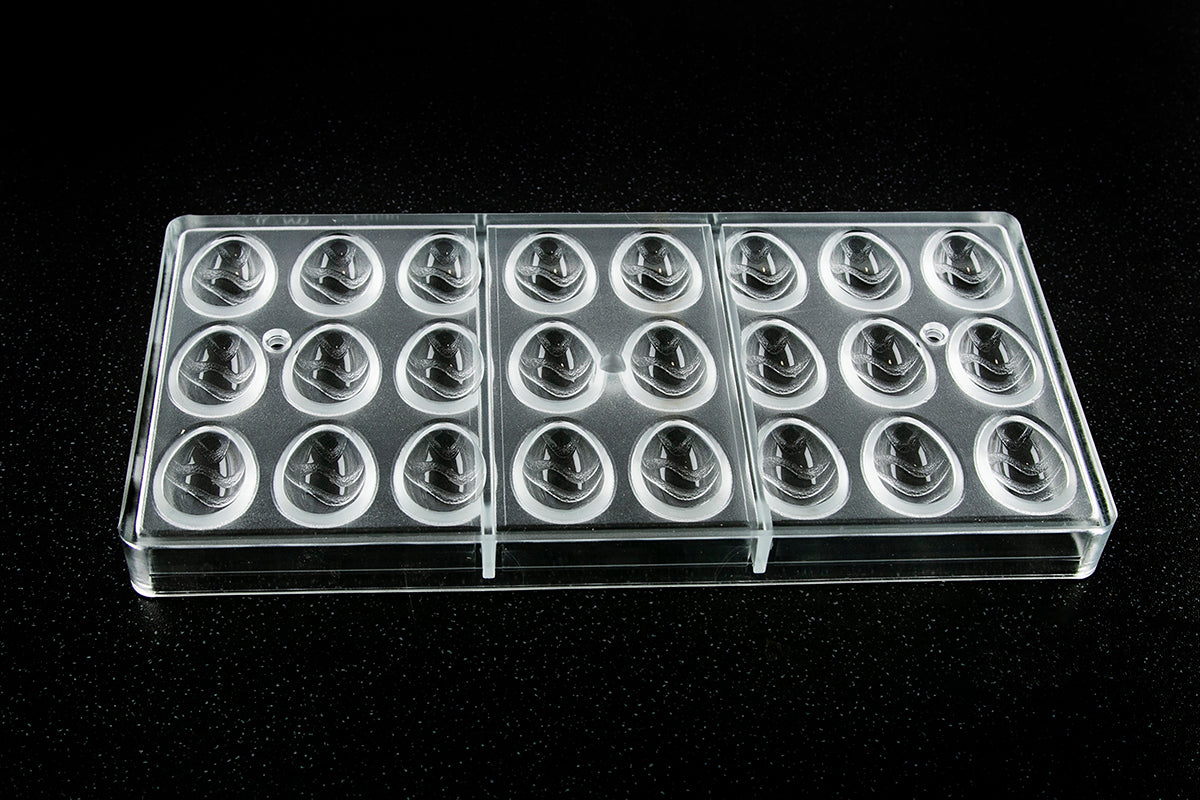 CW12090 - Chocolate World - Egg With Wave Pattern Polycarbonate Mould