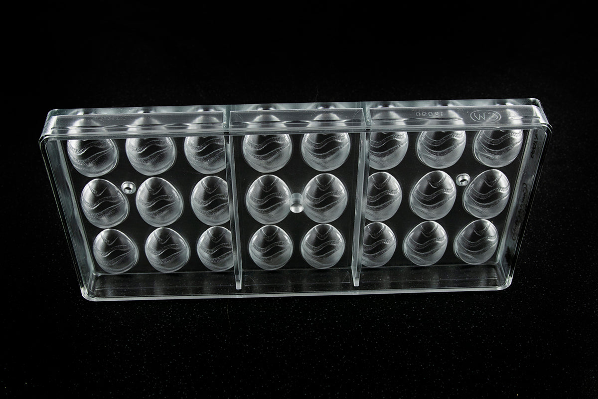 CW12090 - Chocolate World - Egg With Wave Pattern Polycarbonate Mould