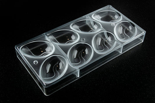 CW12107 - Chocolate World - Egg With Flame Design Polycarbonate Mould